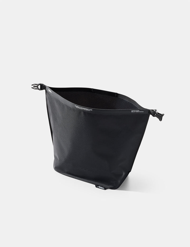 Matador FlatPak Waterproof Toiletry Case (V2) in Black - open Black toiletry case on a white background