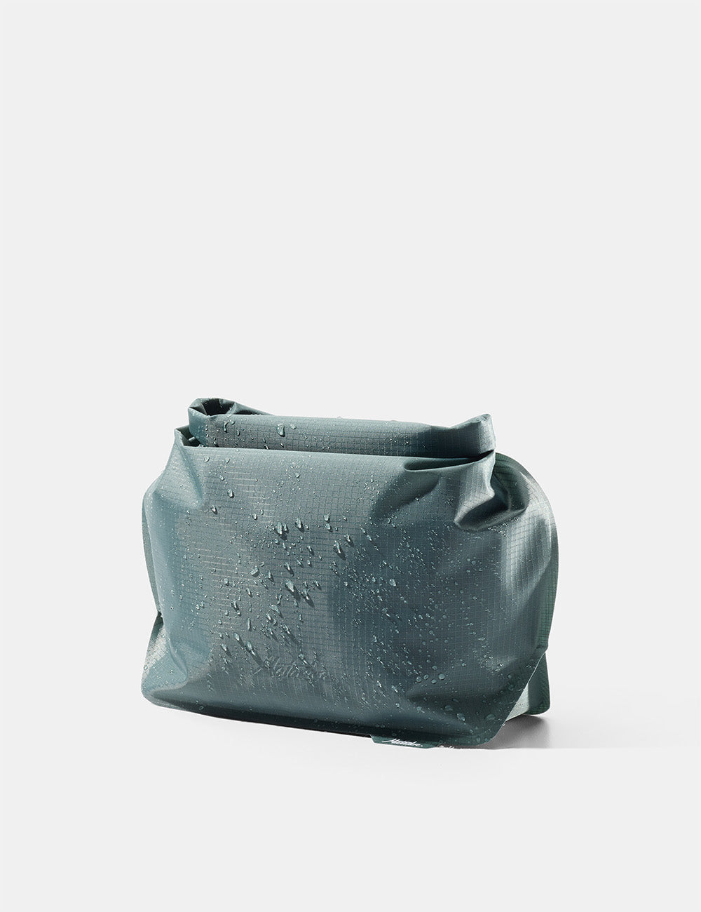 Matador FlatPak Waterproof Toiletry Case (V2) in Juniper - blue-green toiletry bag on a white background