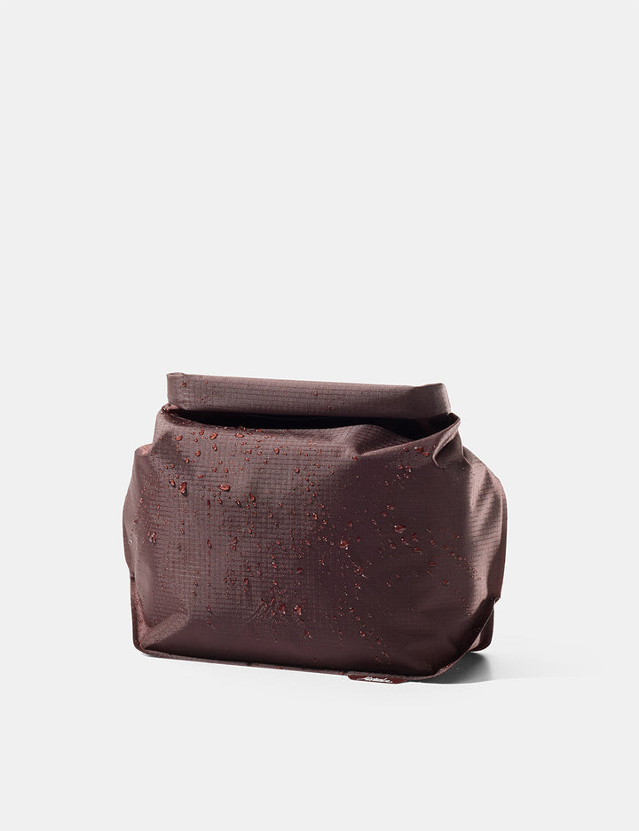 Matador FlatPak Waterproof Toiletry Case (V2) in Garnet - garnet toiletry bag on a light gray background
