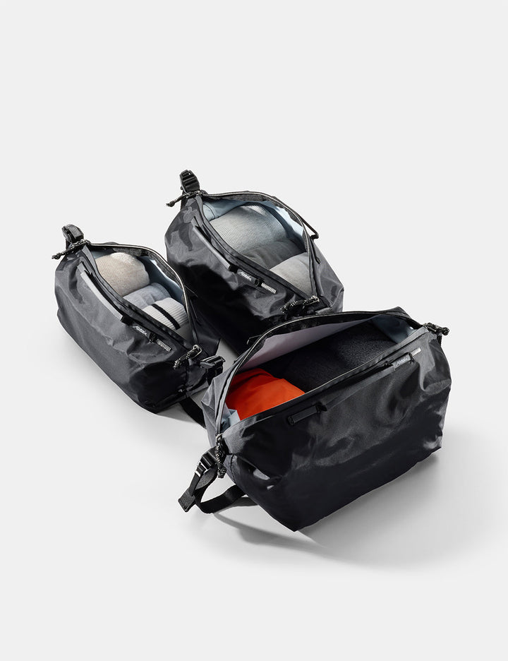 Matador Gear Cube Set (V2) in Black - black gear cubes with open compartments on a light gray background