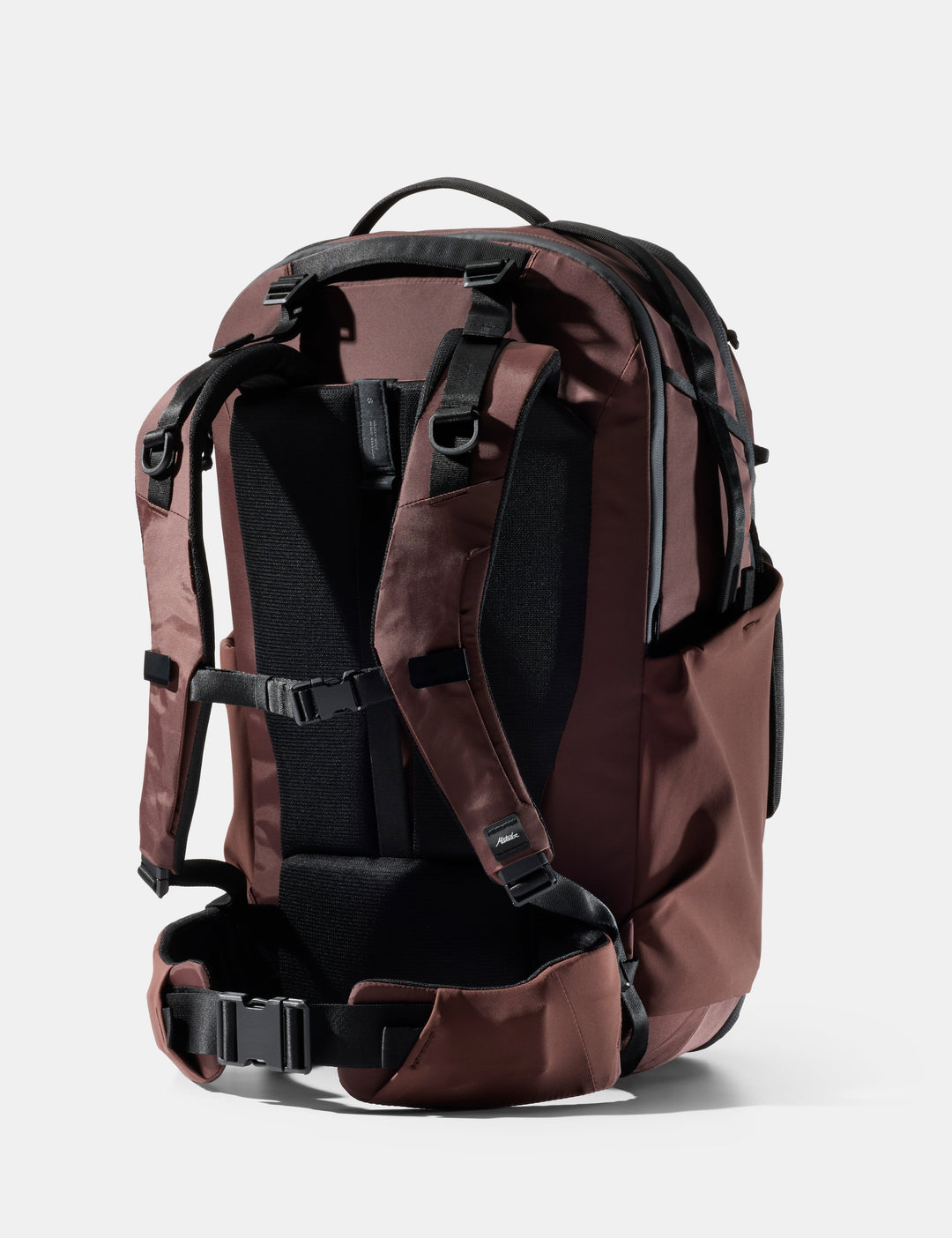 Matador 45L Global Travel Pack in Garnet - garnet backpack with black straps on a white background