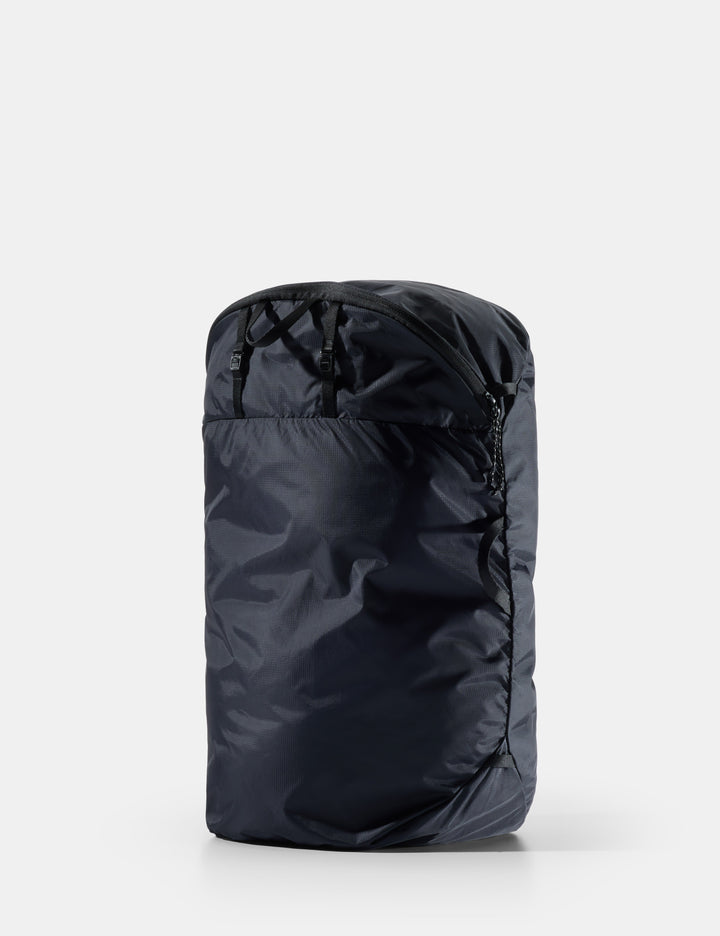 Matador Packable Laundry Bag - black compression sack on a white background