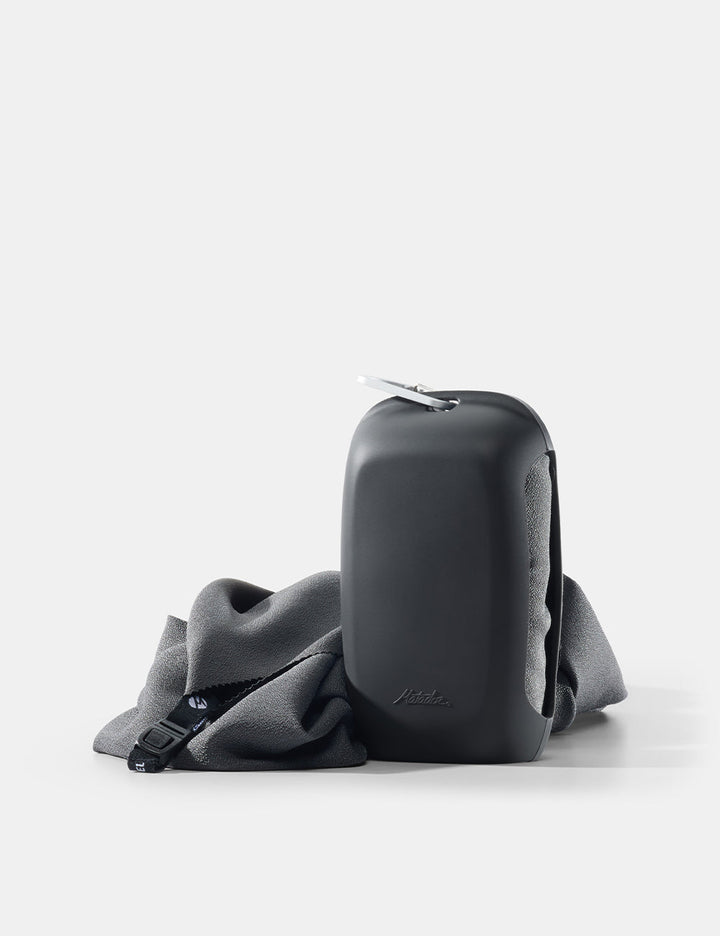 Matador NanoDry Towel - Large 132 x 60cm in Charcoal - gray towel and case on a white background