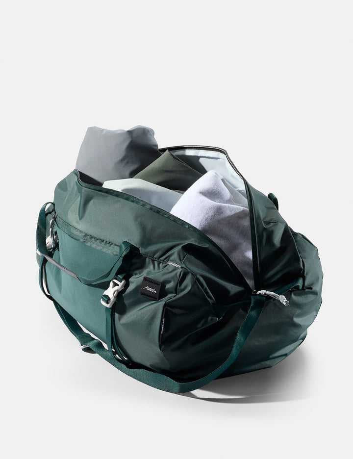 Matador 30L Packable Duffel in Juniper - green duffel bag on a light gray background
