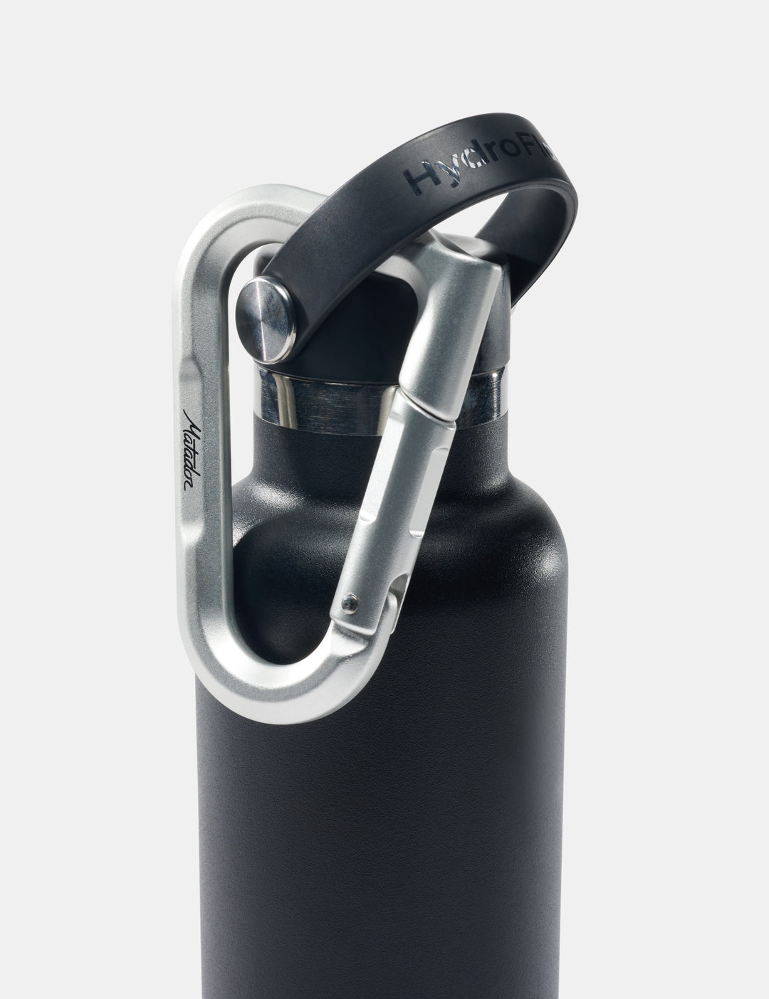 Matador BetaLock in Gold - black water bottle with silver carabiner on a white background