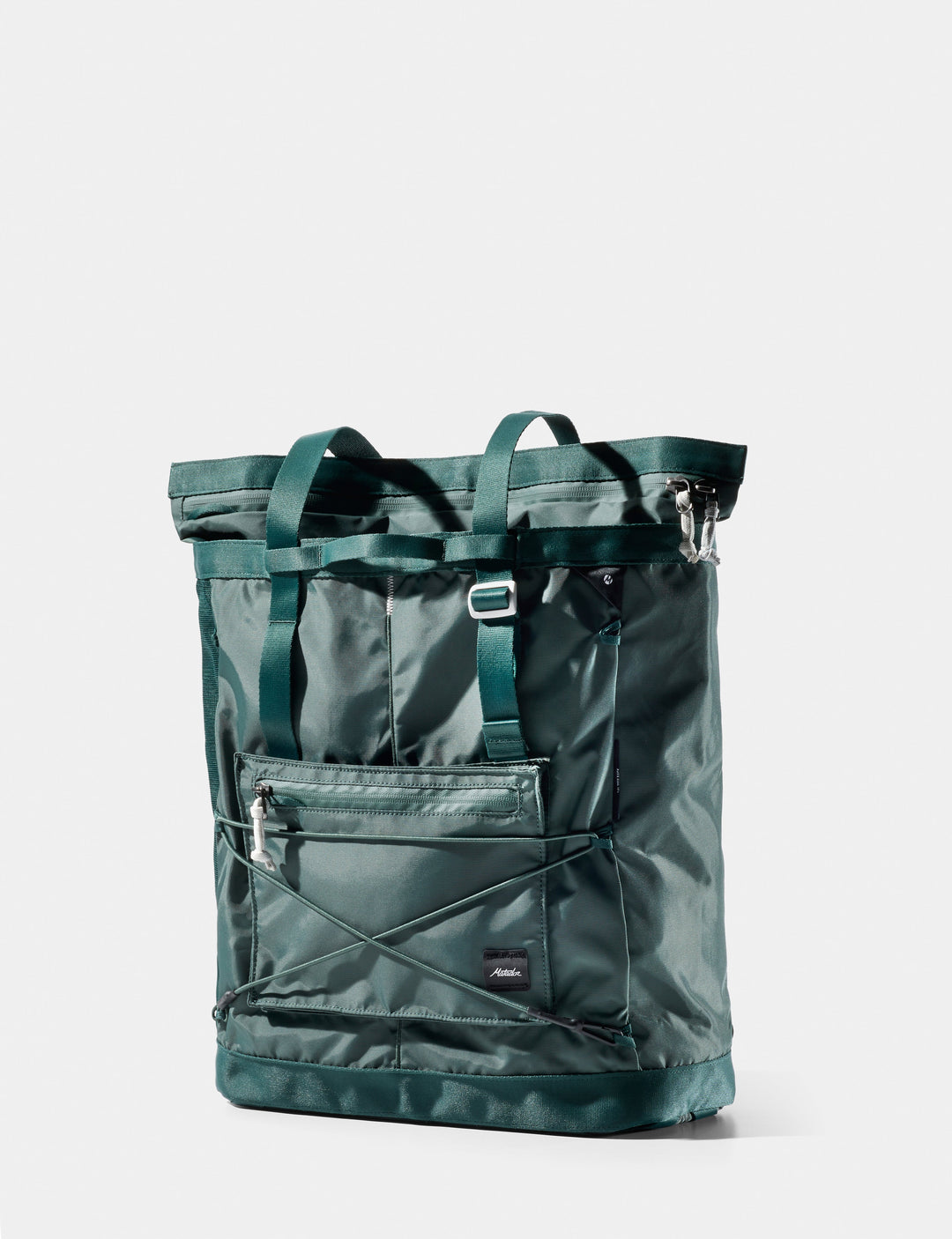 Matador 24L Tote Pack in Juniper - green tote bag with multiple pockets on a white background