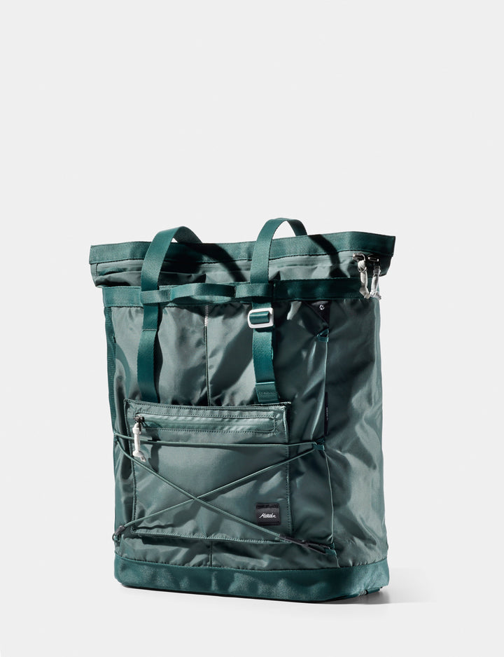 Matador 24L Tote Pack in Juniper - green tote bag with multiple pockets on a white background