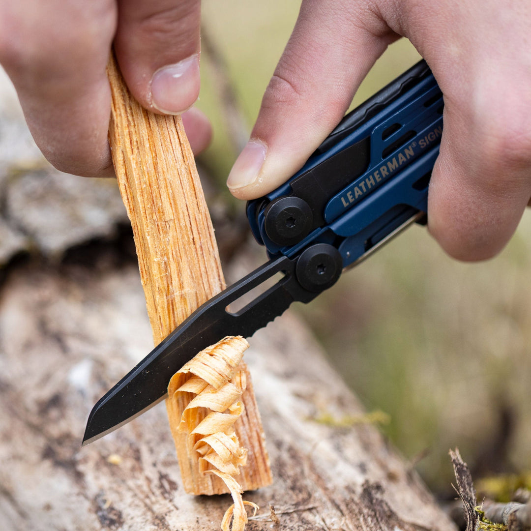Leatherman Signal - whittling kindling with the combo blade, Nocturnal - Nitecore Singapore