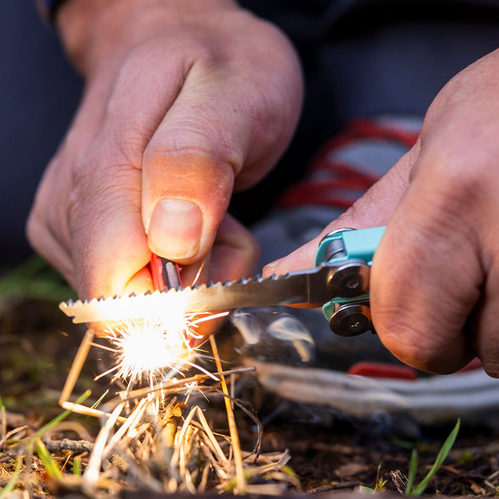 Leatherman Signal - striking sparks into tinder - Nitecore Singapore